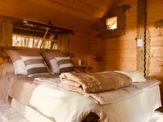 Chambre individuelle cosy dans cabane en bois